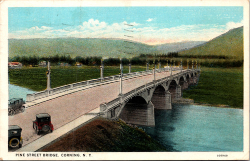 Vintage postcard showing Pine Street Bridge in Corning New York with early automobiles