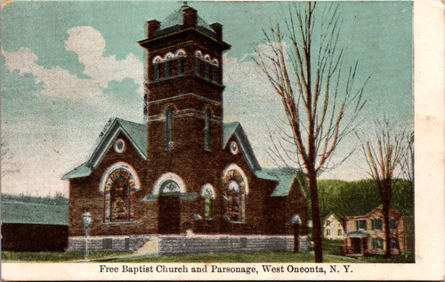 Color postcard showing the Free Baptist Church in West Oneonta New York with a tall brick tower, stained glass windows, and a parsonage house beside it.