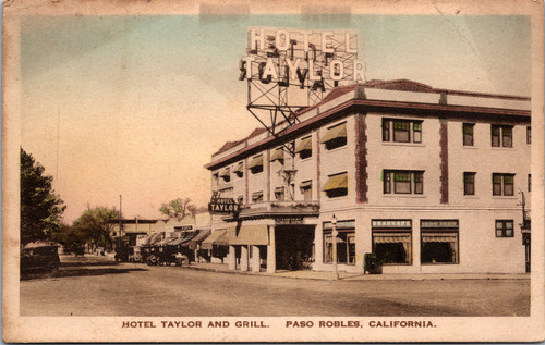 Hand-colored vintage postcard showing Hotel Taylor and Grill in Paso Robles California with large rooftop sign and early automobile street scene