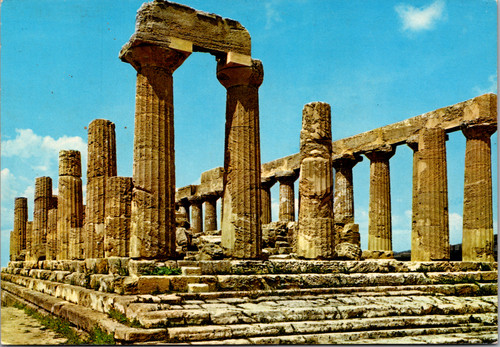 Vintage color postcard showing the Temple of Juno in Agrigento Sicily with ancient Greek columns at the Valley of the Temples