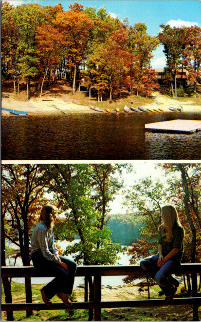 Woods and Waters Campground in White Cloud Michigan showing fall lake and lodge views