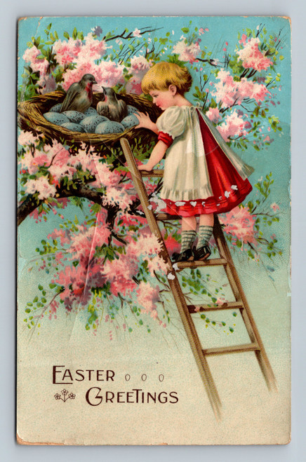 Antique Easter postcard showing girl climbing ladder to bird nest with eggs in flowering tree