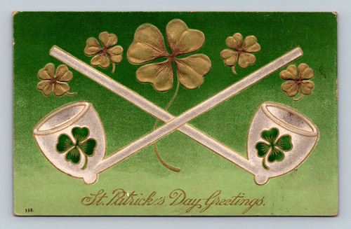 Antique St Patricks Day postcard with crossed Irish pipes and shamrocks