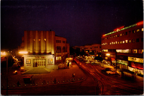 Vintage postcard of Tel Aviv 2nd November Square at night showing Mugrabi Cinema and Pinsker Street