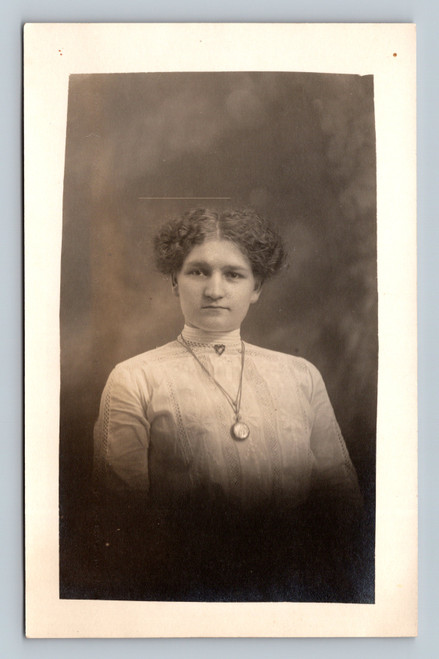 Vintage RPPC portrait of Miss Etta Seet Edwardian hairstyle pendant necklace