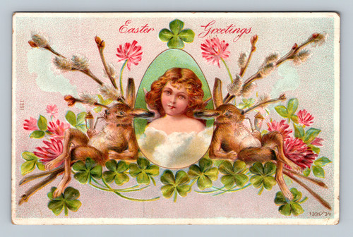 Antique Easter postcard showing cherub girl portrait with rabbits clover and flowers Easter Greetings