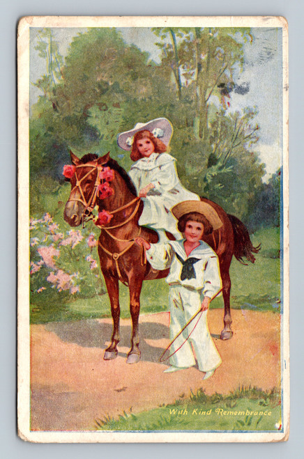 Girl on horse led by boy