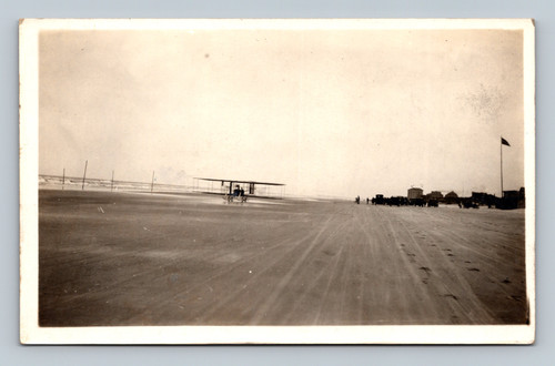 RPPC airplane beach scene postcard