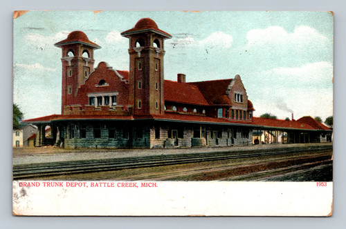 Postcard showing Grand Trunk Railroad depot with twin towers and tracks Battle Creek Michigan 1912