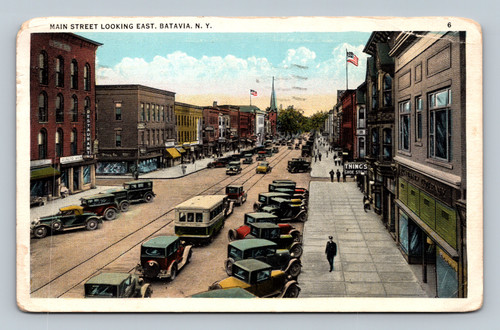 Main Street looking east with Things Shoe Store in Batavia NY vintage postcard