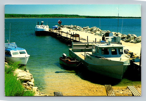 Naubinway harbor with fishermen and boaters on northern Lake Michigan waters