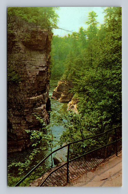 Vertical sandstone cliffs at Ausable Chasm New York vintage postcard by Curteichcolor