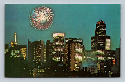 RCA Building and Midtown Manhattan skyline at night in New York City postcard