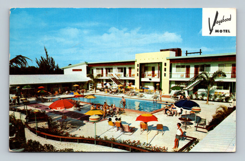 Vintage postcard of Miami motel with Olympic style swimming pool and cocktail lounge