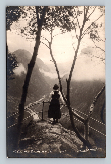 Norwegian girl looking down the valley at Stalheim Hotel Norway