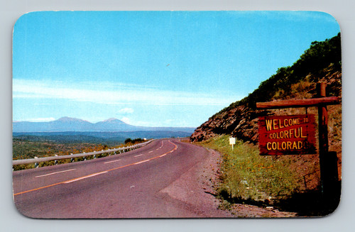 Colorful Colorado state line highway sign postcard by Sanborn Souvenir Co.
