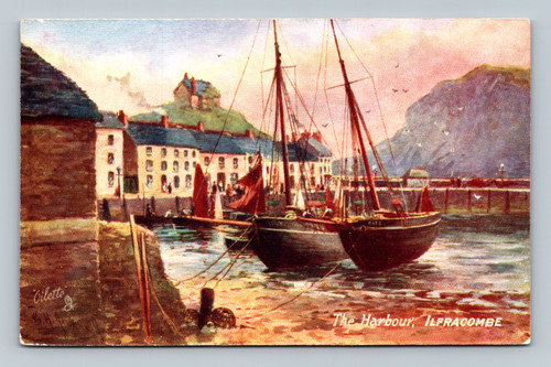 The Harbour with boats clustering around the quay and two piers at Ilfracombe