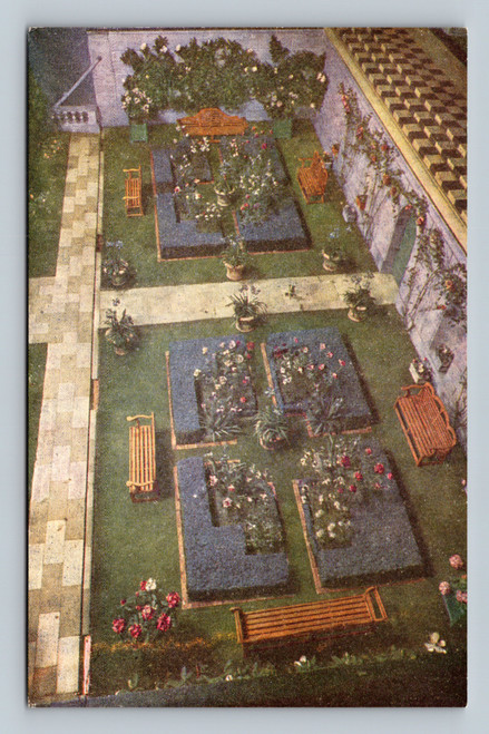 The Queen's Dolls' House Garden with flower beds and box hedges