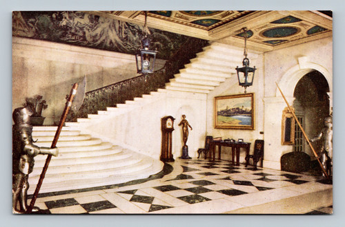Entrance Hall of the Queen's Dolls' House with marble staircase and suits of armour