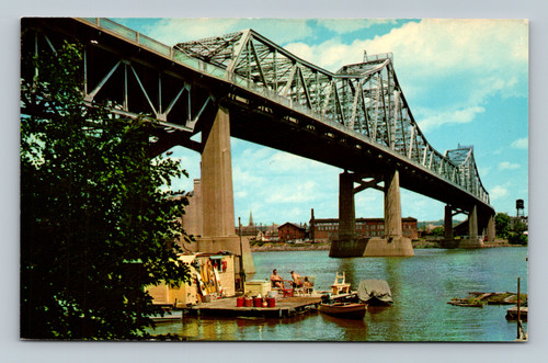 Bridge spanning the Mississippi River with various watercraft at La Crosse Wisconsin