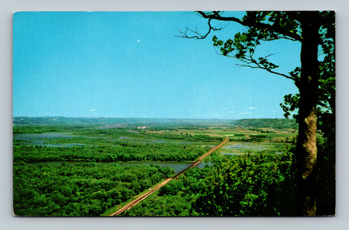 Wisconsin River flowing into Mississippi River south of Prairie du Chien with high bluffs and valley