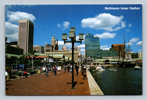 Baltimore Inner Harbor with Harborplace pavilions and Frigate Constellation