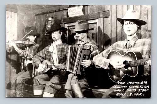 Cowboy show and cowboy orchestra at Wall Drug Store in Wall South Dakota