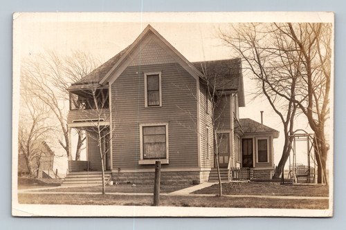 Antique RPPC postcard showing residential house in Prophetstown Illinois