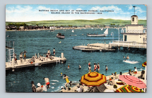 Bathing beach and bay at Newport Harbor with Balboa Island in the background