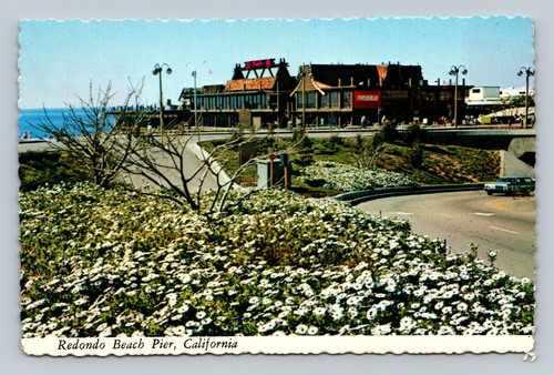 Entrance to Redondo Beach Pier with dining and shopping overlooking the Pacific Ocean