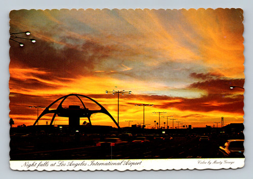 Nightfall at Los Angeles International Airport with Theme Building silhouette