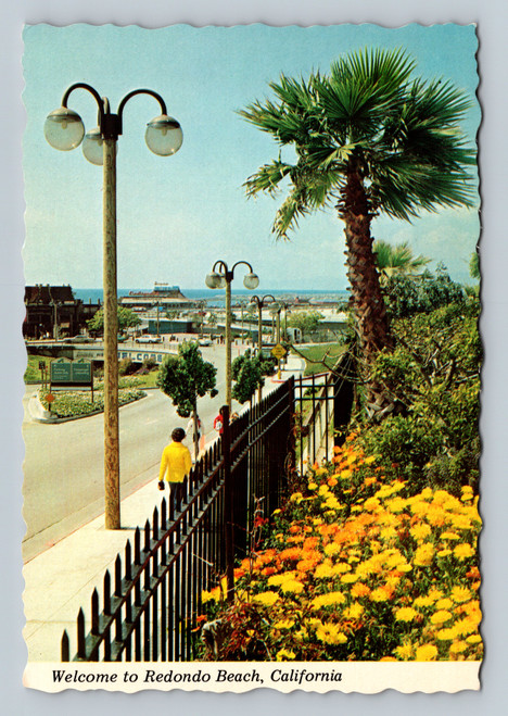 Approaching entrance to Redondo Beach Pier with shops and eateries