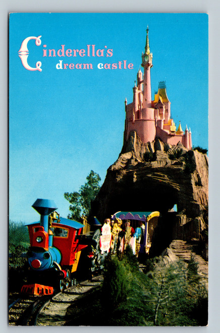 Cinderella's Castle at Disneyland with Casey Jr. train passing below in Fantasyland