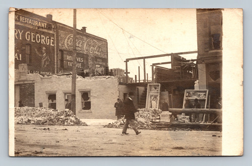 Vintage postcard of a restaurant in Central Square with TANS postmark