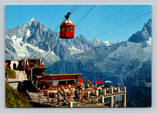 Terrace of Planpraz with Brévent cable car and mountain peaks in Chamonix-Mont-Blanc
