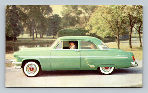 1954 Mercury 2 Door Sedan with White Wall Tires and Fender Shields