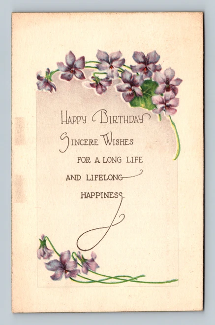 Birthday greeting card with wishes for a long life and lifelong happiness