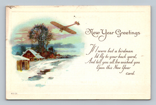 plane flying over snowy landscape with cabin New Years postcard