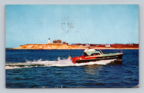 Sport cruiser passing Nobska Light on Cape Cod postcard