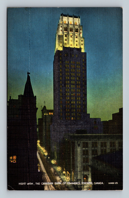 Night view of the Canadian Bank of Commerce building with flood-lighting in Toronto