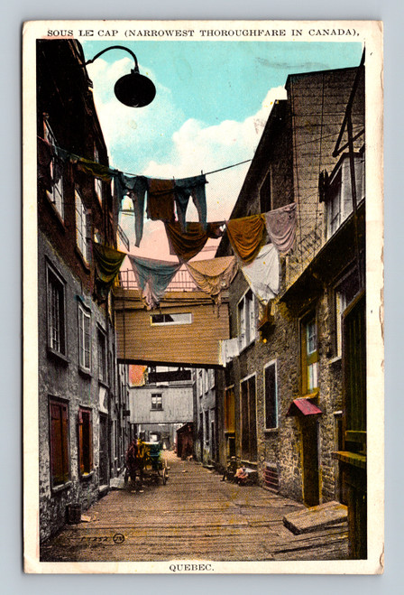 Narrowest thoroughfare in Canada under the cap in Quebec vintage postcard