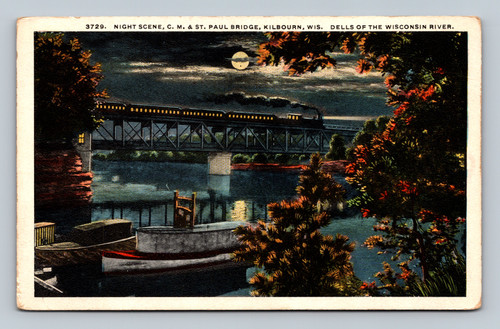 Night scene of C. M. & St. Paul Bridge at Kilbourn Wisconsin River Dells