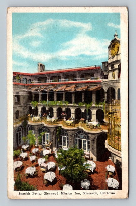 Spanish Patio with colonnades of slender arches and overhanging balconies at Glenwood Mission Inn Riverside California