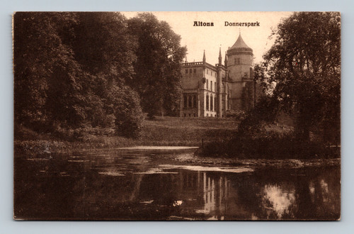 epia vintage postcard showing Donner-Schloss in Donners Park, Altona, Hamburg, Germany, viewed across a pond surrounded by mature trees.
