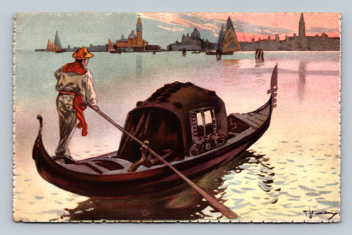 man rowing gondola across lagoon at sunset
