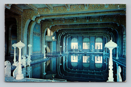 Interior of the Roman Pool at Hearst San Simeon State Historical Monument with mosaic tiles and alabaster lamps