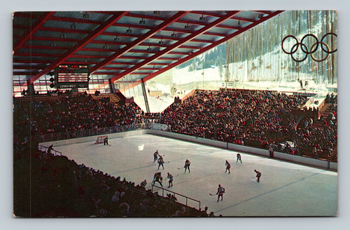 Hockey action at 1960 Winter Olympics Interior Ice Arena Squaw Valley