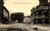 West Street in New Berlin New York showing the New Eagle Hotel, storefronts, dirt road, and horse and wagon era street scene.