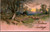 Silk antique Christmas postcard with shepherd and flock on country path at sunset