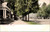 Vintage undivided back postcard of West Main Street in Peru Indiana with tree lined homes and early street scene